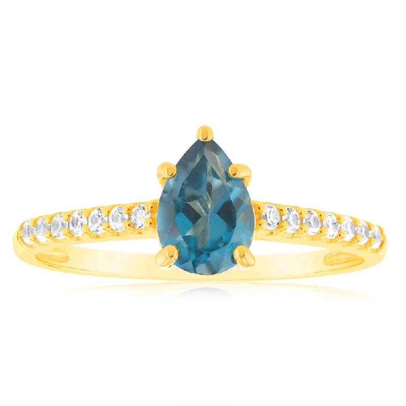 1 London Blue Topaz, 12Created Sapphire & 2 Single Cut Diamonds in 9ct Yellow Gold Ring